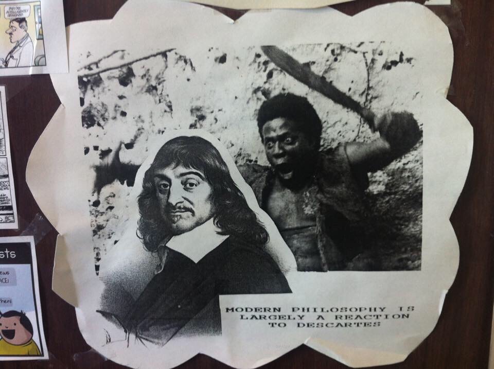 Photograph of a collage of Rene Descartes, juxtaposed with an image of a black man with a machete, so it appears that Descartes is about to be attacked. Text reads: “modern philosophy is largely a reaction to Descartes”